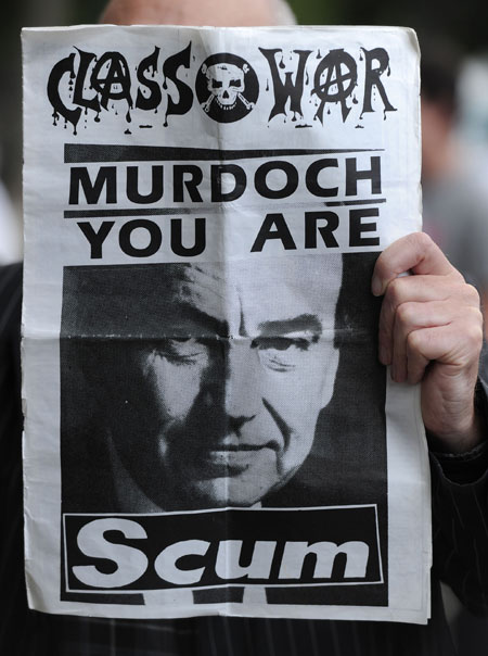 Rupert Murdoch faced protests when he turned up for his hearing